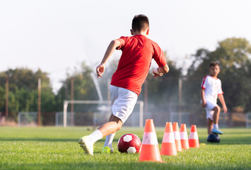 Boy Soccer Player In Training.