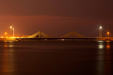MANAMA , BAHRAIN - DECEMBER 08: Sheikh Salman Causeway bridge on December 08, 2019, Bahrain. The design with two sail-like structures depict Bahrains traditional pearl diving historic culture...