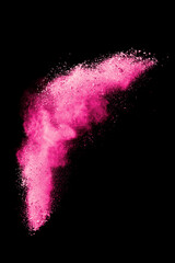 Pink powder explosion on white background. Paint Holi.