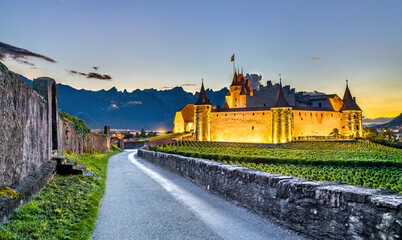 Aigle Castle in the Canton of Vaud, Switzerland - obrazy, fototapety, plakaty
