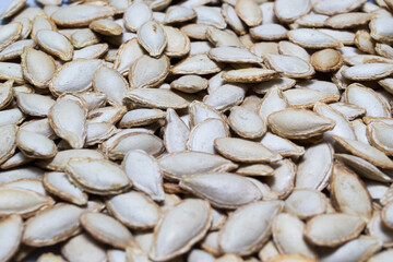 A closeup shot of dry pumpkin seeds