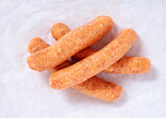 Sausages in a studio setting, isolated on white