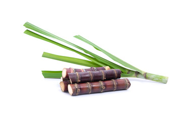 sugar cane and brown sugar on white isolate background