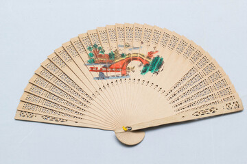 Fan a hand waving back and forth. Fold-able easy to carry when you go which is likely to come from...