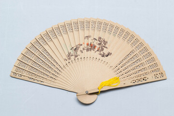 Fan a hand waving back and forth. Fold-able easy to carry when you go which is likely to come from...