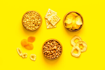 Fast food snacks collection - nuts and dried fruits top view