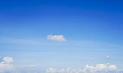 beautiful blue sky and white fluffy cloud horizon outdoor for background.