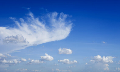 beautiful blue sky and white fluffy cloud horizon outdoor for background.