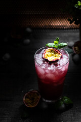 Cocktail with passion fruit and mint 