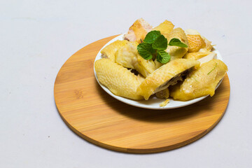 Amazing of Vietnamese food for Tet holiday in spring, it is traditional food on lunar new year: Banh chung, Boiled chicken, pickled onions, spring rolls ...