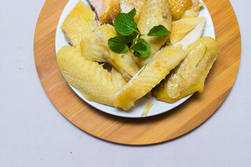 Amazing of Vietnamese food for Tet holiday in spring, it is traditional food on lunar new year: Banh chung, Boiled chicken, pickled onions, spring rolls ...