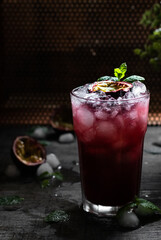 Cocktail with passion fruit and mint 