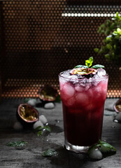 Cocktail with passion fruit and mint 