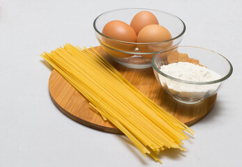 Raw homemade Egg noodles and ingredients for Egg noodles