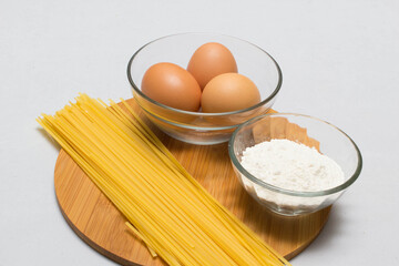 Raw homemade Egg noodles and ingredients for Egg noodles