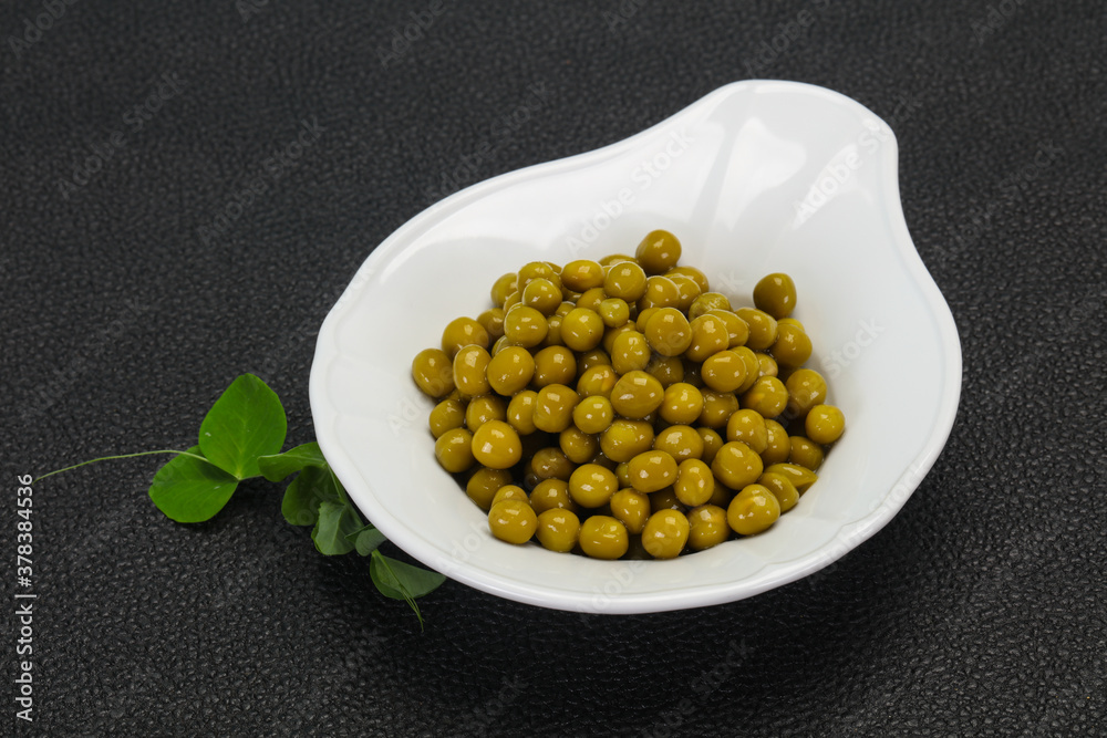 Wall mural canned green peas in the bowl