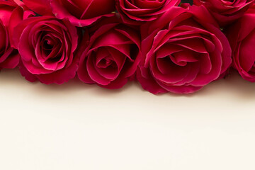 red roses and white card with a place for a congratulatory text on a black background