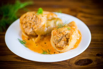 stuffed with meat and rice with roasted pepper sauce
