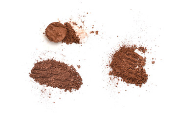 Makeup cosmetics. Eyeshadow in brown color crushed palette, colorful eye shadow powder on white background