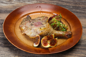 Roasted. duck. leg with plum and apple
