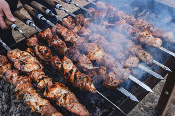 Background of kebabs on skewers. Close-up