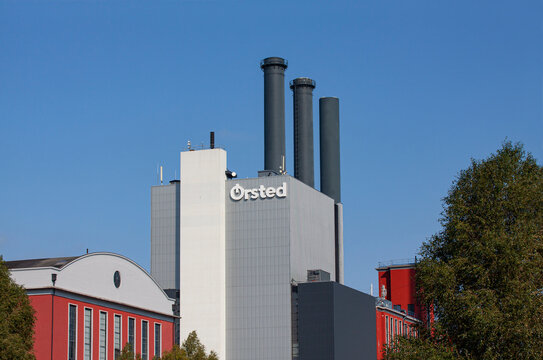 &Oslash;rsted Orsted Oersted logotype on building. Danish renewable company power plant factory producing electricity and energy from wind turbines. Copenhagen, Denmark - September 16, 2020