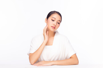 Fototapeta premium Portrait Charming beautiful young asia woman. Attractive beautiful young female has beauty facial skin. Pretty girl touching her face, Glamour lady get happy with white background, copy space