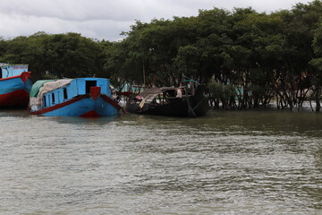 Naklejka premium boat on the river