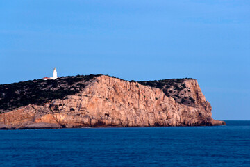 Fototapeta na wymiar Faro de la isla Conillera.Parque natural Cala Bassa-Cala Compte.Ibiza.Balearic islands.Spain.