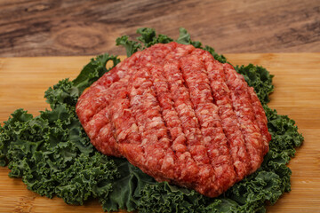 Raw beef burger cutlet for cooking