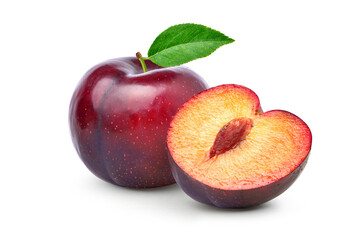 Juicy red Plum fruits with cut in half and green leaves isolated on white background.