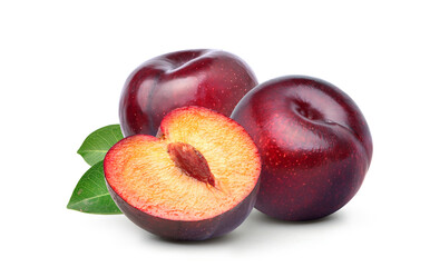 Juicy red Plum fruits with cut in half and green leaves isolated on white background.