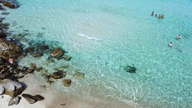 One of best sea beach in the world. Santa Teresa Gallura, Sardinia sea. Rena bianca beach. Drone shot of clean, blue sea.  Holiday concept. Santa Teresa di Gallura, Italy. 9 September 2020