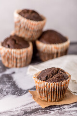 Sweet cakes or cupcakes on light marble background. Holiday cake celebration, delicious dessert, close up