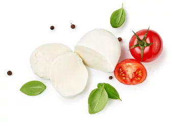 Foto op Plexiglas Pieces of mozzarella Buffalo cheese with basil leaves. Top view of sliced cheese with tomatoes isolated on white background. © Tatyana Sidyukova