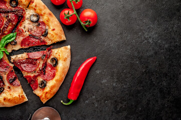 pepperoni pizza with salami sausages, mozzarella, olives, Provencal herbs, signature tomato sauce...