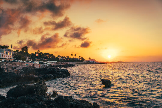 Spain, Province of Alicante, Denia, Rocky coast of&Ocirc;&oslash;&Omega;Mediterranean Sea at moody sunset