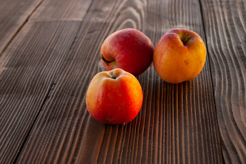 apples on a wooden table