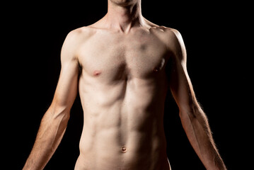 A skinny muskular man with funnel or sunken chest, better known in medicine as Pectus Excavatum. Front view with arms down.