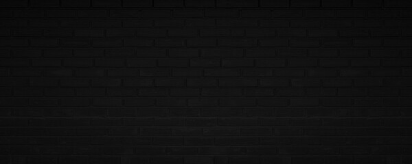 Abstract Black Brick Wall Texture Background. Weathered Brickwork Design Backdrop. Wide Panorama Picture.