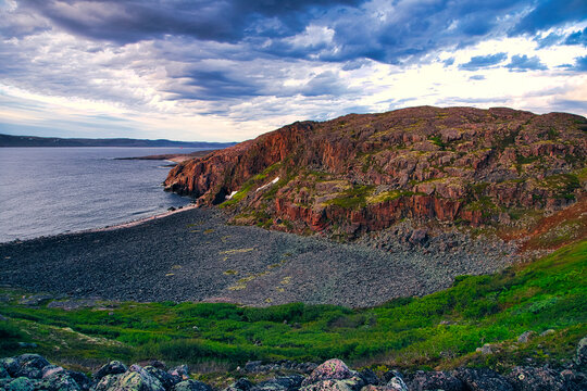 Cliffs and rocky beach of Barents Sea