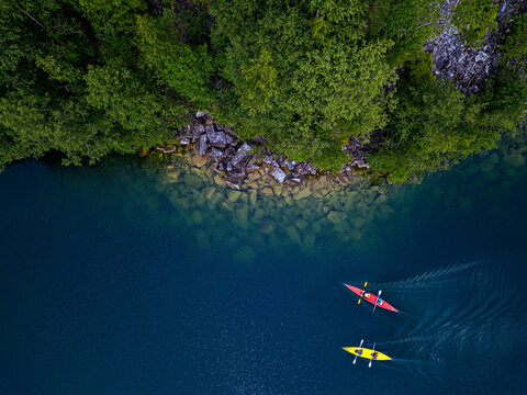 Russia, Republic of Karelia, Sortavala, Aerial view of&Ocirc;&oslash;&Omega;kayakers&Ocirc;&oslash;&Omega;at rocky shore of Lake Light