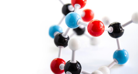 Selective focus of science molecular model structure on white background