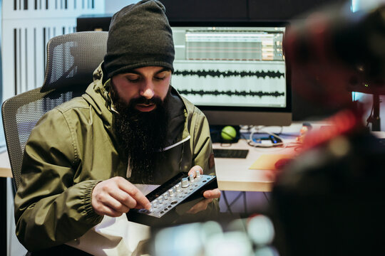Dj making a video tutorial in his studio
