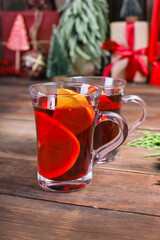 mulled drink red wine fruit tea hot grog glass winter serving size spices beverage New Year and Christmas top view copy space for text food background rustic