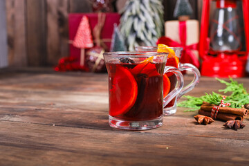mulled drink red wine fruit tea hot grog glass winter serving size spices beverage New Year and...
