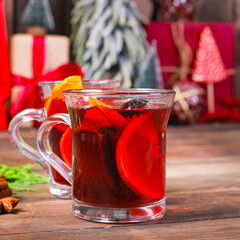 mulled drink red wine fruit tea hot grog glass winter serving size spices beverage New Year and...