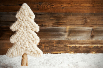 Fabric White Christmas Tree With Snow. Brown Rustic Wooden Background. Copy Space For Advertisement