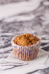 Sweet cakes or cupcakes on light marble background. Holiday cake celebration, delicious dessert, close up