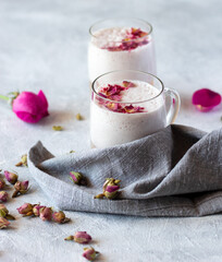 Pink moon milk with rose petals, healthy ayurverdic drink